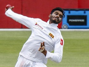 Sri Lanka's bowler Dhananjaya de Silva bowls during day two of the second cricket test match between South Africa and Sri Lanka at St. George's Park in Port Elizabeth, South Africa, on Feb. 22, 2019. (MICHAEL SHEEHAN/AP)
