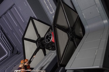 Disney Imagineers view a life-size TIE fighter as they work on Star Wars: Rise of the Resistance at Star Wars: Galaxy’s Edge, opening in summer 2019 at Disneyland Resort in California and fall 2019 at Walt Disney World Resort in Florida. On Star Wars: Rise of the Resistance, guests will be able to join an epic battle between the First Order and the Resistance – including a face-off with Kylo Ren. (Joshua Sudock/Disney Parks)