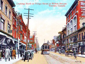 This souvenir postcard, dated 1915, looks north on Yonge St. before the present intersection with Dundas St. was "streamlined." It was in the summer of 1923 that an attempt to lessen traffic congestion in the area was made by connecting Dundas St., that ran east from Yonge St., with Wilton Ave. that intersected with Yonge a short distance south of the Yonge-Dundas corner and ran east. Several buildings were demolished and Dundas and Wilton were connected with the construction of a short diagonal road. In this view the red with white trim "HOME" building is located north of the Yonge-Wilton corner. After the realignment it found itself south of the newly created Yonge-Dundas St. E. corner.