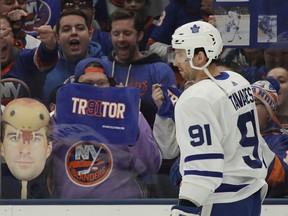 Fans on Long Island taunt Maple Leafs centre and former New York Islanders captain John Tavares during warmups on Thursday night at NYCB Live’s Nassau Coliseum in Uniondale, N.Y.. (GETTY IMAGES)