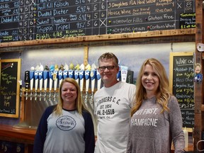 Hollie Parker, Dave Dally and Dawn Dally of Caledonia Brewing pose in Dunedin, Fla., on Thursday, Feb. 14, 2019.  THE CANADIAN PRESS/Melissa Couto