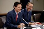 Canada's Prime Minister Justin Trudeau (L) and his principal secretary Gerald Butts take part in a meeting on Parliament Hill in Ottawa on April 21, 2017. (REUTERS/Chris Wattie)