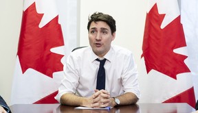 Prime Minister Justin Trudeau delivers remarks prior to a meeting with elected members of a borough in his riding in Montreal on Friday, Feb. 1, 2019. (THE CANADIAN PRESS/Paul Chiasson)