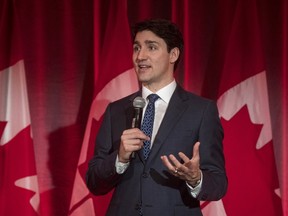 Prime Minister Justin Trudeau address attendees at the Liberal fundraising event at the Delta hotel in Toronto, Ont., on Thursday, Feb. 7, 2019. (THE CANADIAN PRESS/ Tijana Martin)