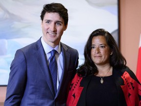 Prime Minister Justin Trudeau and Veterans Affairs Minister Jodie Wilson-Raybould attend a swearing in ceremony at Rideau Hall in Ottawa on Monday, Jan. 14, 2019.