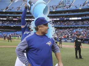 Blue Jays manager John Gibbons gets doused after the Toronto Blue Jays' final game of the season at the Rogers Centre in Toronto, Ont. on Wednesday September 26, 2018.
