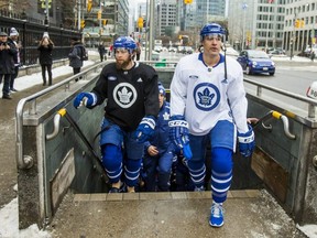 Toronto Maple Leafs Jake Muzzin (left) and Patrick Marleau exit the subway at Osgoode Station on their way to the 2019 Toronto Maple Leafs Outdoor Practice at Nathan Phillips Square in Toronto, Ont. on Thursday February 7, 2019. Ernest Doroszuk/Toronto Sun/Postmedia