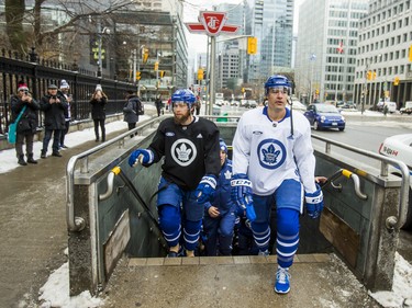 Toronto Maple Leafs Jake Muzzin (left) and Patrick Marleau exit the subway at Osgoode Station on their way to the 2019 Toronto Maple Leafs Outdoor Practice at Nathan Phillips Square in Toronto, Ont. on Thursday February 7, 2019. Ernest Doroszuk/Toronto Sun/Postmedia