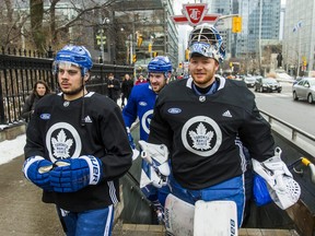 Toronto Maple Leafs Auston Matthews (from left), Frederik Gauthier and Frederik Andersen exit the subway at Osgoode Station on their way to the 2019 Toronto Maple Leafs Outdoor Practice at Nathan Phillips Square in Toronto, Ont. on Thursday February 7, 2019. Ernest Doroszuk/Toronto Sun/Postmedia