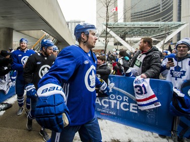 Toronto Maple Leafs make their way past fans for the 2019 Toronto Maple Leafs Outdoor Practice at Nathan Phillips Square in Toronto, Ont. on Thursday February 7, 2019. Ernest Doroszuk/Toronto Sun/Postmedia