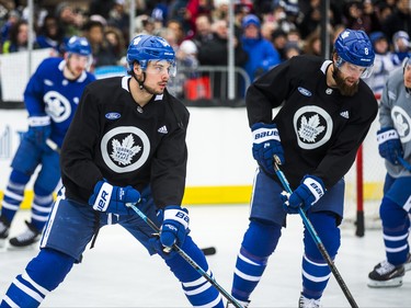Toronto Maple Leafs Auston Matthews (left) and Jake Muzzin on the ice for the 2019 Toronto Maple Leafs Outdoor Practice at Nathan Phillips Square in Toronto, Ont. on Thursday February 7, 2019. Ernest Doroszuk/Toronto Sun/Postmedia