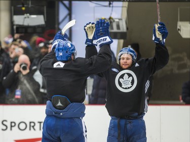 Toronto Maple Leafs Auston Matthews (left) and Connor Brown on the ice during the 2019 Toronto Maple Leafs Outdoor Practice at Nathan Phillips Square in Toronto, Ont. on Thursday February 7, 2019. Ernest Doroszuk/Toronto Sun/Postmedia
