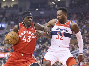 Raptors forward Pascal Siakam (43) and Washington Wizards forward Jeff Green (32) on Wednesday February 13, 2019 at Scotiabank Arena in Toronto. Veronica Henri/Toronto Sun/Postmedia Network