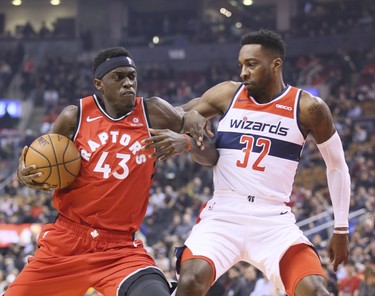 Raptors forward Pascal Siakam (43) and Washington Wizards forward Jeff Green (32) on Wednesday February 13, 2019 at Scotiabank Arena in Toronto. Veronica Henri/Toronto Sun/Postmedia Network