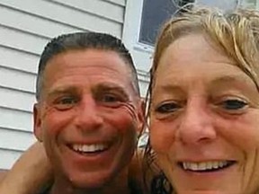 Eric and Laura Huska enjoy their hot tub in happier times.