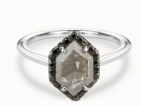 The Grey Matter ring is a 1.31 ct. salt and pepper diamond really pops, surrounded by a fine black diamond halo; $4,372.