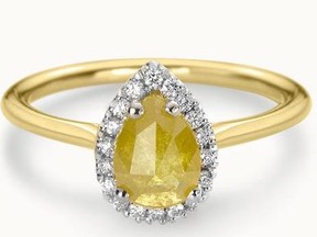The Sunbeam ring will brighten up even the gloomiest day with its unique champagne yellow centre stone accentuated by a halo of bright white; $2,705.