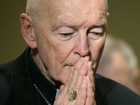 In this Nov. 14, 2011, file photo, then Cardinal Theodore McCarrick prays during the United States Conference of Catholic Bishops' annual fall assembly in Baltimore.