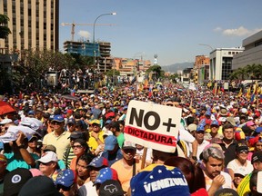 Demonstrators protest against the government of Nicolás Maduro on the Main avenue of Las Mercedes, municipality of Baruta, on Feb. 2, 2019 in Caracas, Venezuela. (Edilzon Gamez/Getty Images)