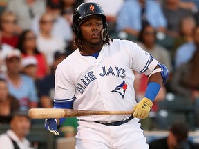 Vladimir Guerrero Jr. of the Toronto Blue Jays reacts as he bats during the Arizona Fall League All-Star Game at Surprise Stadium on November 3, 2018 in Surprise, Arizona. (Christian Petersen/Getty Images)