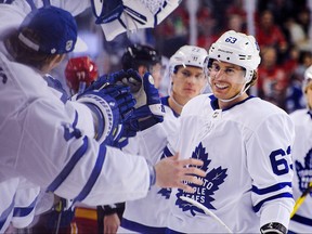 Tyler Ennis of the Toronto Maple Leafs celebrates with the bench after scoring against the Calgary Flames  during the game at Scotiabank Saddledome on March 4, 2019 in Calgary. (Derek Leung/Getty Images)
