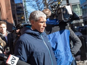 William "Rick" Singer leaves Boston Federal Court after being charged with racketeering conspiracy, money laundering conspiracy, conspiracy to defraud the United States, and obstruction of justice on March 12, 2019 in Boston, Massachusetts. Singer is among several charged in alleged college admissions scam.
