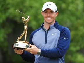 Rory McIlroy of Northern Ireland celebrates with the trophy after winning The Players Championship on The Stadium Course at TPC Sawgrass on March 17, 2019 in Ponte Vedra Beach, Florida. (Sam Greenwood/Getty Images)