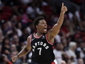 Toronto Raptors guard Kyle Lowry reacts after shooting a three-pointer during Sunday's win over Miami. (AP PHOTO)