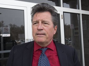 Defence lawyer Calvin Barry speaks to the media after his clients, Victoria and Jason Small, admitted their guilt in a Newmarket court in an animal abuse case. (Stan Behal/Toronto Sun)