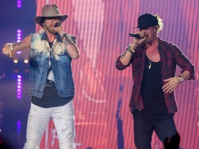 Bryan Kelly and Tyler Hubbard of Florida Georgia Line perform at the Saddledome in Calgary, Ab., on November 19, 2016. Mike Drew/Postmedia
