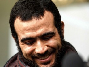 Omar Khadr leaves Court of Queen's Bench in Edmonton, on Monday, March 25, 2019 after a judge declared his sentence expired. Photo by Ian Kucerak/Postmedia