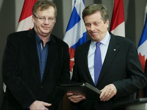 City Budget Chief Gary Crawford (left) and Toronto Mayor John Tory. (Veronica Henri, Toronto Sun)