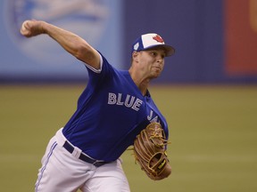 Toronto Blue Jays starter Sam Gaviglio pitches to the Milwaukee Brewers during Monday's game in Montreal. (THE CANADIAN PRESS)