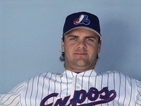 Former Montreal Expo Larry Walker was honoured before Monday's game between the Jays and Brwers in Montreal. (THE CANADIAN PRESS)