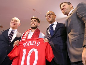 From left, TFC president Bill Manning, new signing Alejandro Pozuelo, GM Ali Curtis and coach Greg Vanney. (DAVE ABEL/Toronto Sun)