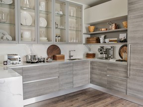A working kitchen by Scavolini houses kitchen tools, appliances and accessories.