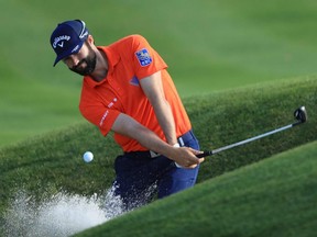 Adam Hadwin plays a shot from a bunker on the second hole during the first round of The Players Championship on The Stadium Course at TPC Sawgrass in Ponte Vedra Beach, Fla., on Thursday, on March 14, 2019.