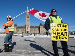 Convoy for Canada protestors march in front of Parliament Hill in Ottawa, Ontario, on February 19, 2019.