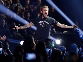 Canadian Music Hall of Fame recipient Corey Hart performs “I wear my sunglasses” during the Juno Music Awards at Budweiser Gardens in London, Ont., on March 17, 2019. (LARS HAGBERG/AFP/Getty Images)