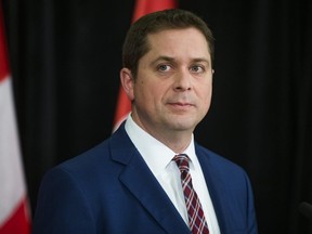 Andrew Scheer, leader of the Conservative Party of Canada, the Official Opposition, responds to Justin Trudeau's statement today during a press conference at the Sheraton Gateway Hotel at Pearson Airport in Toronto on Thursday, March 7, 2019.