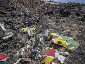 Wreckage lies at the scene of an Ethiopian Airlines flight that crashed shortly after takeoff at Hejere near Bishoftu, or Debre Zeit, some 50 kilometers (31 miles) south of Addis Ababa, in Ethiopia Sunday, March 10, 2019.