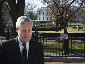 Special Counsel Robert Mueller walks past the White House after attending services at St. John's Episcopal Church, in Washington, Sunday, March 24, 2019. Mueller closed his long and contentious Russia investigation with no new charges, ending the probe that has cast a dark shadow over Donald Trump's presidency.