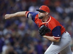 St. Louis Cardinals relief pitcher Bud Norris works against the Colorado Rockies during the ninth inning of a baseball game Friday, Aug. 24, 2018, in Denver. The Toronto Blue Jays have signed right-hander Norris to a minor-league contract with an invitation to major-league spring training.THE CANADIAN PRESS/AP/David Zalubowski