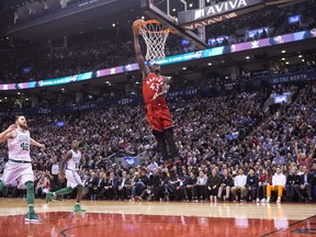 Toronto Raptors forward Pascal Siakam dunks on the Boston Celtics during second half NBA basketball action in Toronto on Tuesday, February 6, 2018. THE CANADIAN PRESS