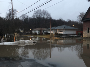 A Bolton neighbourhood was evacuated because of major flooding on Friday, March 15, 2019. (@OPP_COMM_CR)