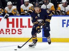 Buffalo Sabres defenceman Brandon Montour (62) controls the puck against the Pittsburgh Penguins, Friday, March. 1, 2019, in Buffalo N.Y. (AP Photo/Jeffrey T. Barnes)