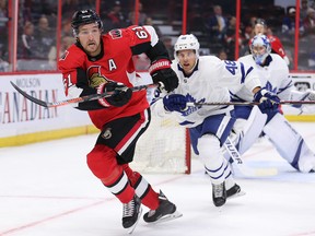 Mark Stone, left, chases the puck with Calle Rosen close on his heels in period one as the Ottawa Senators face the Toronto Maple Leafs at the Canadian Tire Centre in pre-season NHL action. (Wayne Cuddington/Postmedia Network)