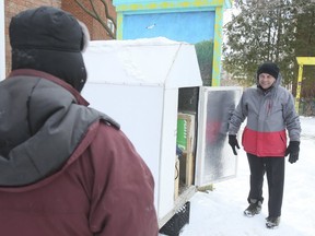 Brian Donlevy in front of his homeless shelter, dubbed a "cramper," on Thursday, March 7, 2019. Dan, who created the shelter, is front left but did not wish to be photographed. (Veronica Henri/Toronto Sun/Postmedia Network)