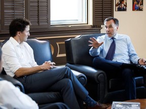 Prime Minister Justin Trudeau meets with Finance Minister Bill Morneau in Ottawa on March 12. (JustinTrudeau/Twitter)