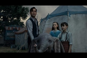 This image released by Disney shows Colin Farrell, Nico Parker and Finley Hobbins in a scene from “Dumbo.”